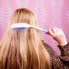 Elderly brushing hair brush